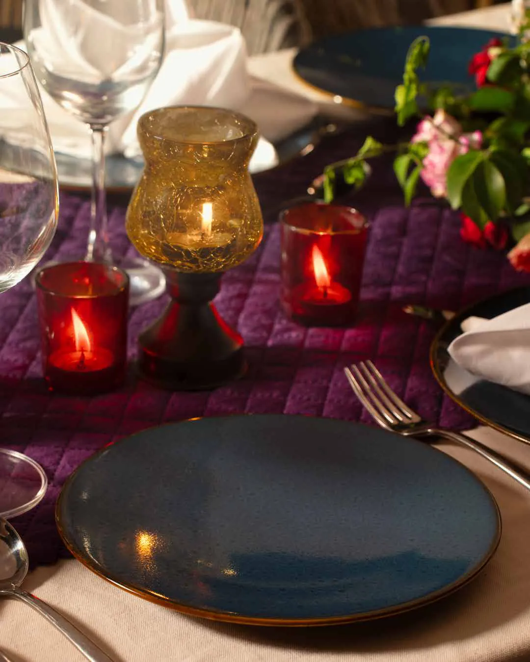 A candlelit table setting at a Soulkin evening